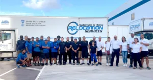 Solomon & Sons Relocation Services team in front of a moving truck.